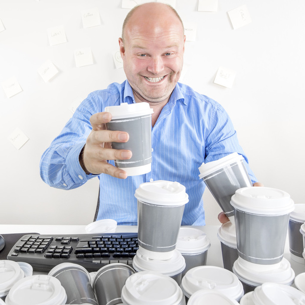 Business man drinks too much coffee - Photo, Image