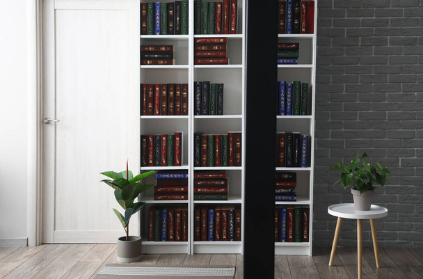 Shelf unit with books in home library - Photo, Image