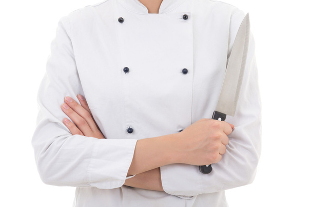 femme en uniforme de chef tenant couteau isolé sur blanc  - Photo, image