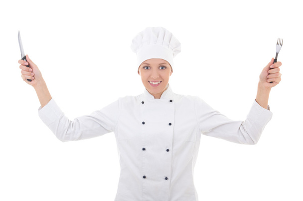 Heureuse jeune femme en uniforme avec o isolé fourchettes et des couteaux de chef - Photo, image