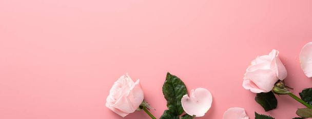 Mother's Day design concept background with pink rose flower on pink table background background - Photo, Image