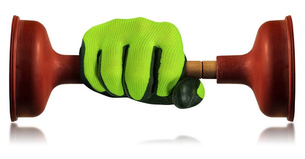 Hand with green and black protective work glove, holding two red rubber plungers with wooden handle, isolated on white background with reflections. - Photo, Image