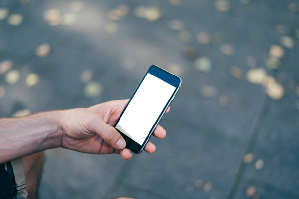Mobiltelefon mockup kép üres képernyő fehér háttér a reklám, kézzel - Fotó, kép