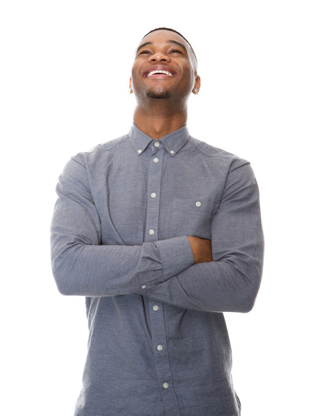 Schwarzer Mann lacht und blickt auf  - Foto, Bild