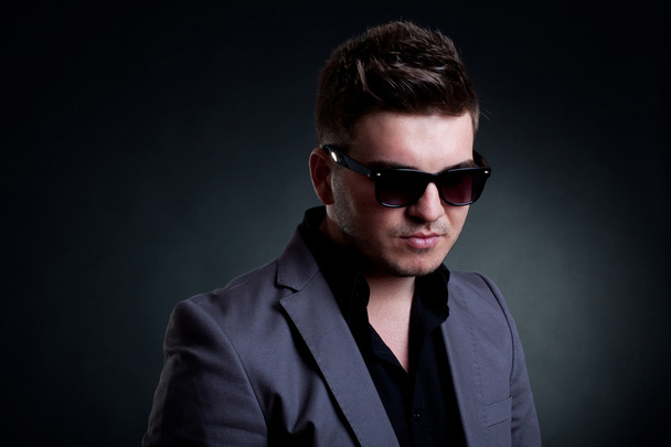 Young handsome man with sunglasses - Фото, изображение