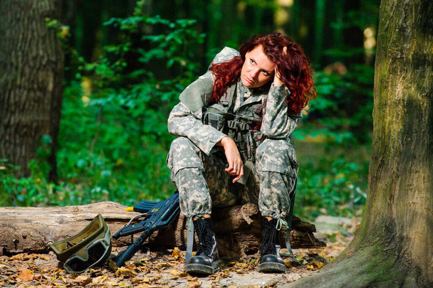 Ukranian female soldier in the forest - Photo, Image
