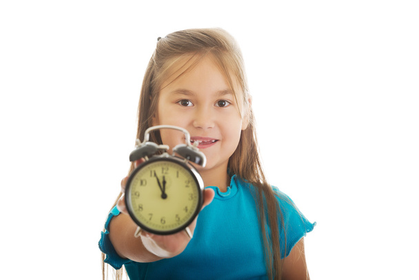 Girl holding the clock - Φωτογραφία, εικόνα