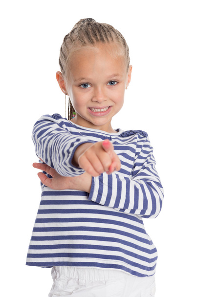 Joyful girl points a finger forward - Фото, изображение
