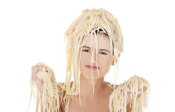 Beautiful woman with noodles on her head - Φωτογραφία, εικόνα