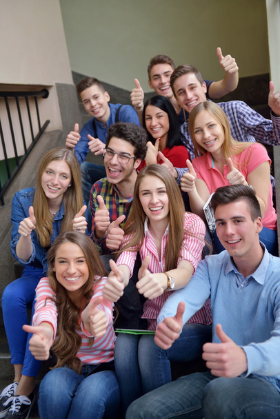 Happy teens group in school - Valokuva, kuva