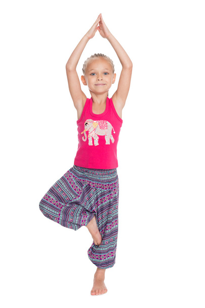 little girl performs gymnastic exercise - Foto, Imagem