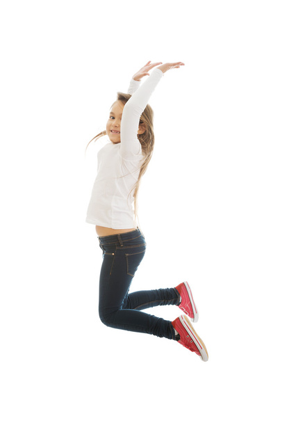 Chica saltando con alegría
 - Foto, Imagen