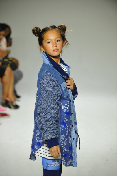 Model walks the runway during the Parsons preview - Photo, image
