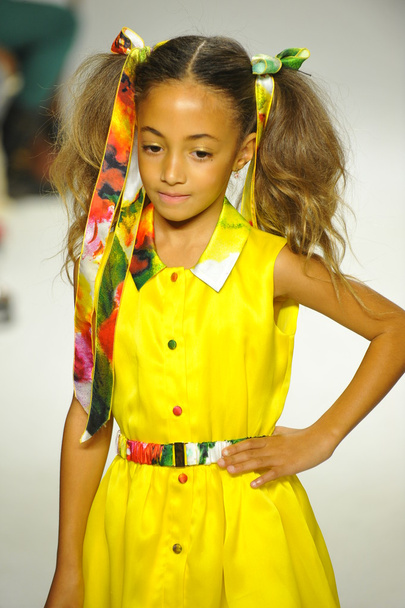 Model walks the runway during the Alivia Simone preview at petite PARADE Kids Fashion Week - Photo, image