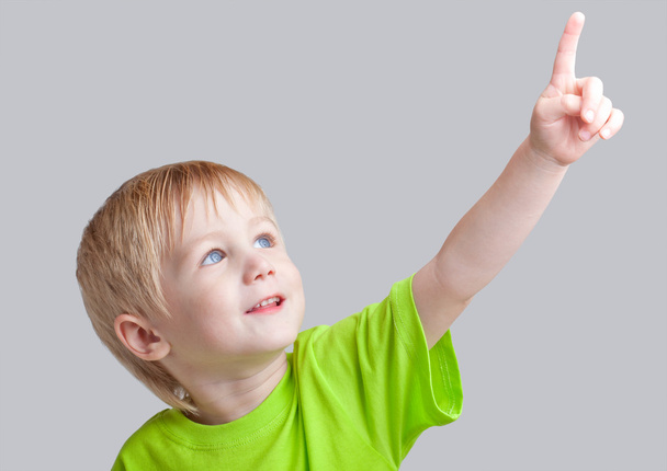 Boy points to something - Фото, изображение
