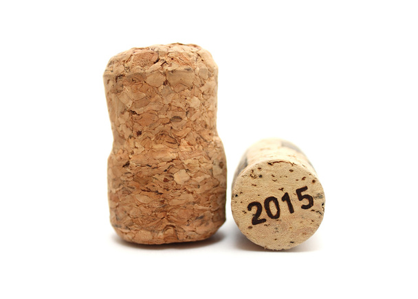 Κρασί Φελλοί που απομονώνονται σε λευκό φόντο closeup με 2015 - Φωτογραφία, εικόνα