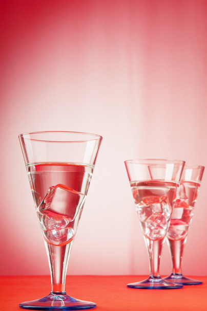 Water in the glass against gradient background - Photo, Image