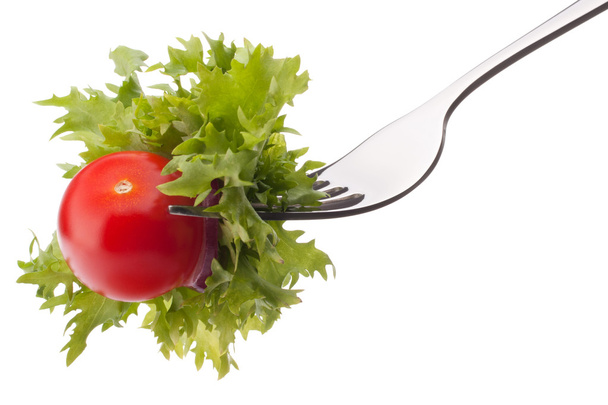Fresh salad and cherry tomato on fork - Foto, immagini