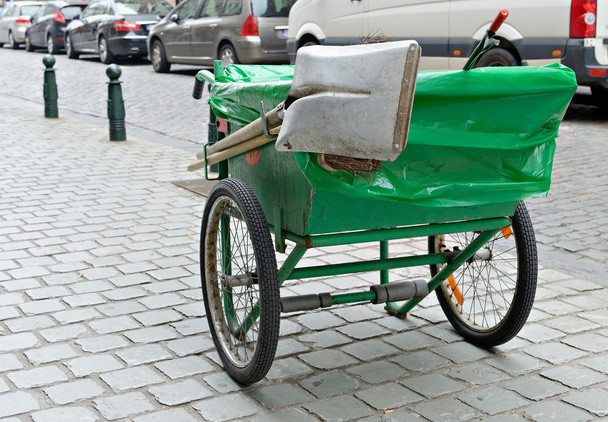 Typical green pushcart of municipal street cleaning service in Brussels - Photo, Image
