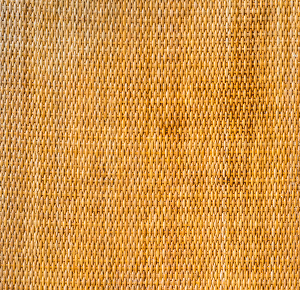 decoratieve achtergrond van bruin handwerk weven textuur rieten s - Foto, afbeelding