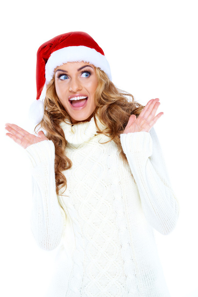 Surprised Pretty White Woman in Santa Hat - Foto, immagini