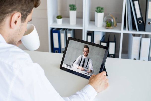 video call online meeting business partners tablet - 写真・画像