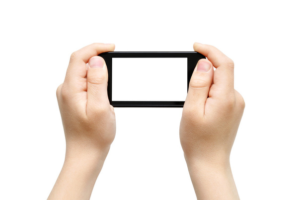 Holding smart phone, playing games - Photo, Image