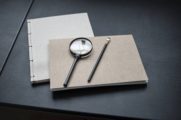 business concept. notebook, pen and glasses on the table. - Foto, imagen