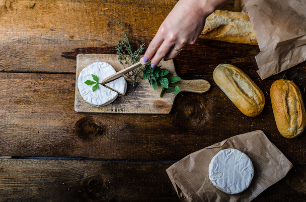 Camembert, soft cheese with homemade pastries - 写真・画像