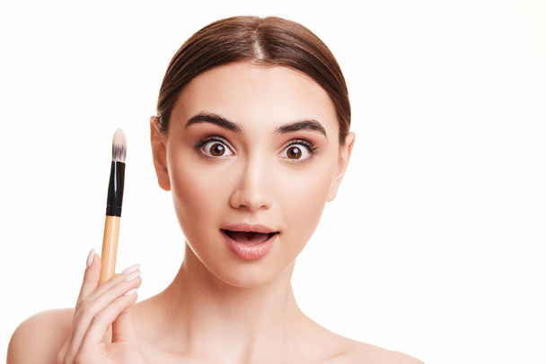young beautiful woman with make-up brush for powder - Photo, image
