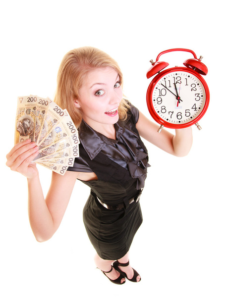 Woman holding money and alarm clock - Foto, Imagem