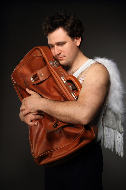 Pan anioła z brązową torebkę - Zdjęcie, obraz