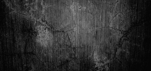 Wand voller Kratzer, unheimlich dunkle Wand, grunzige Zementstruktur für den Hintergrund - Foto, Bild