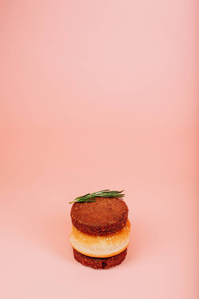 burger on pink background. High quality photo - Foto, immagini