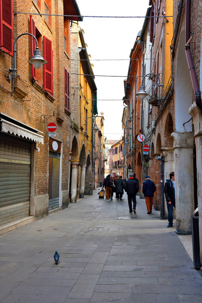 tourists and passers-by in the historic center of the Romagna city-Ferrara Italy - 写真・画像
