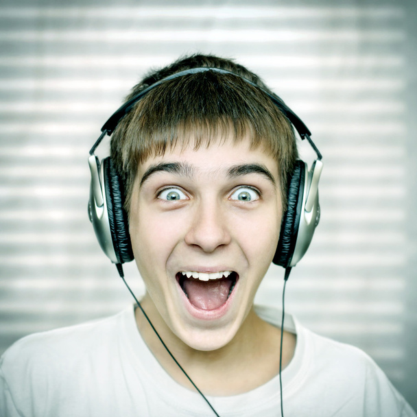 Cheerful Teenager with Headphones - Foto, imagen