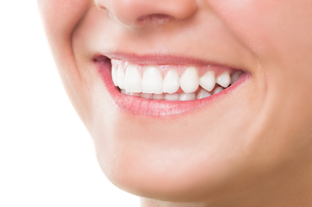 完璧な歯と美しい笑顔の女性 - 写真・画像