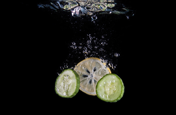 Fresh lemon and cucumber - Fotoğraf, Görsel