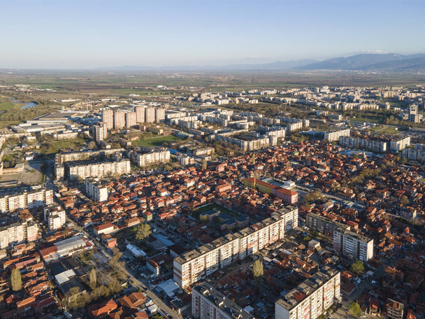 Sunset Aerial view of Stolipinovo ghetto neighborhood in City of Plovdiv, Bulgaria - 写真・画像