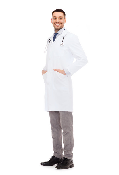 smiling male doctor with stethoscope - Photo, image