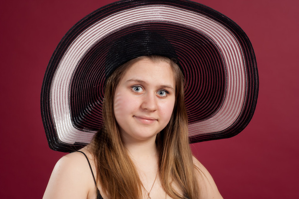 Portrait of girl in hat isolated - Fotó, kép