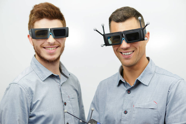 portrait of two men wearing futuristic glasses - Zdjęcie, obraz