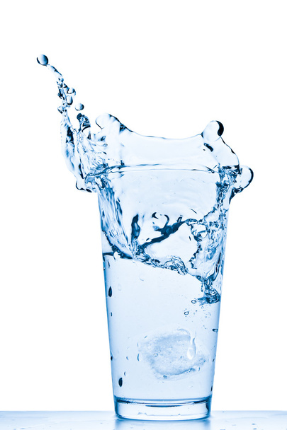 Water splash in glass - Фото, изображение