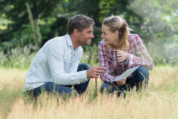 man and woman on grass - Foto, Imagen