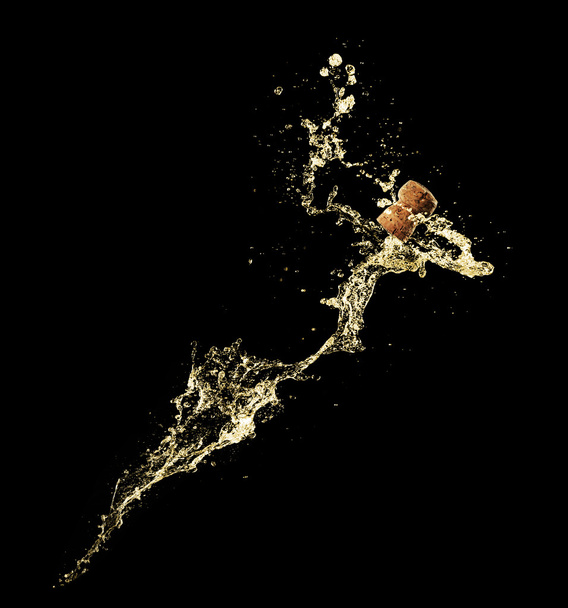Champagne splashes with cork - Fotó, kép