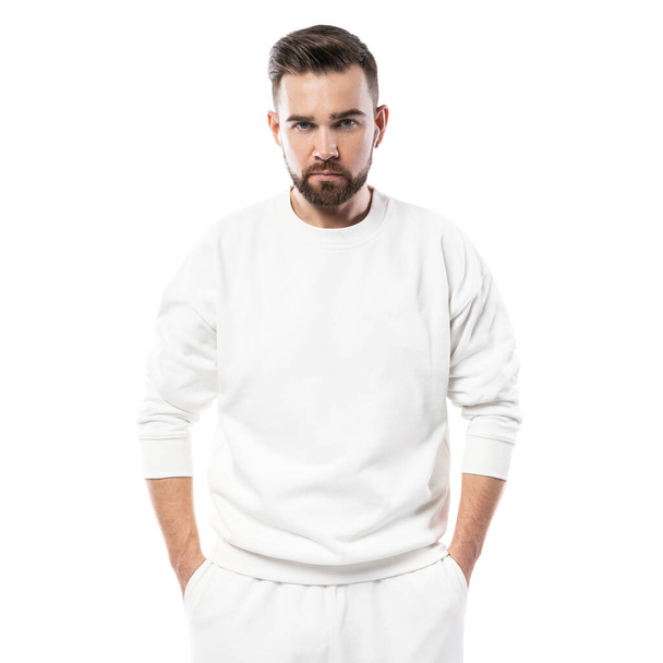 Handsome man wearing blank white sweatshirt isolated on white background - Foto, Imagem