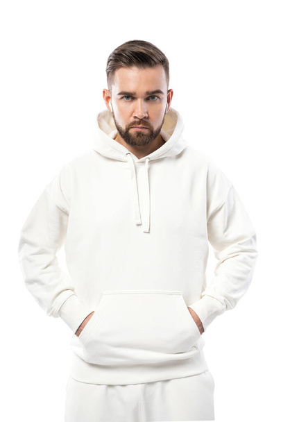 Handsome man wearing white blank hoodie isolated on white background - Photo, Image