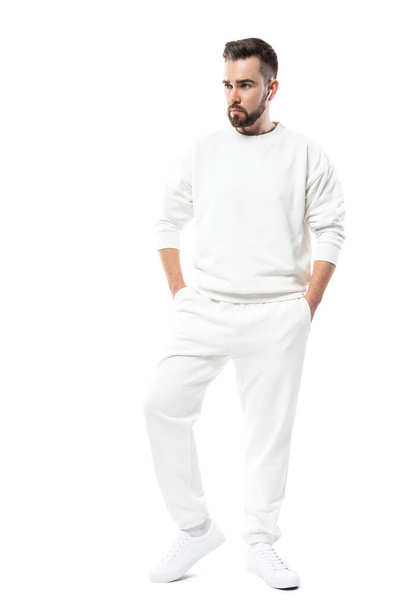 Handsome man wearing blank white clothes isolated on white background - Фото, изображение