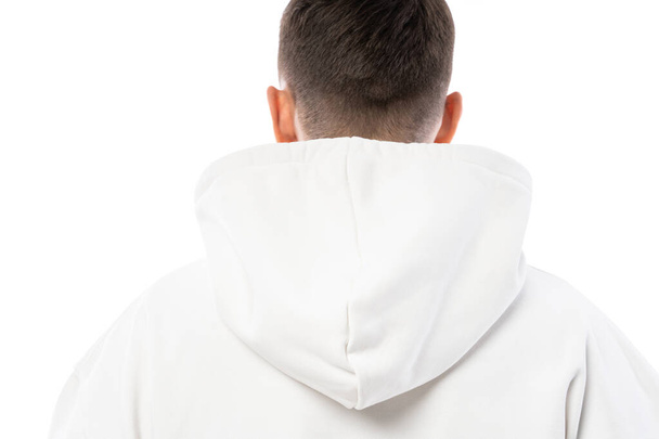 Man wearing blank white hoodie and pants isolated on white background - Valokuva, kuva