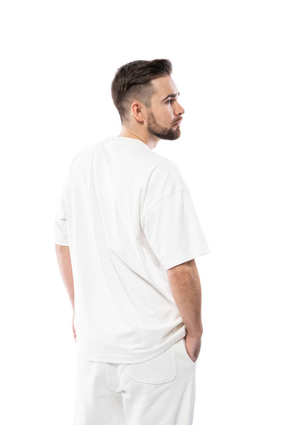 Portrait of handsome man wearing white t-shirt isolated on white background - Photo, Image
